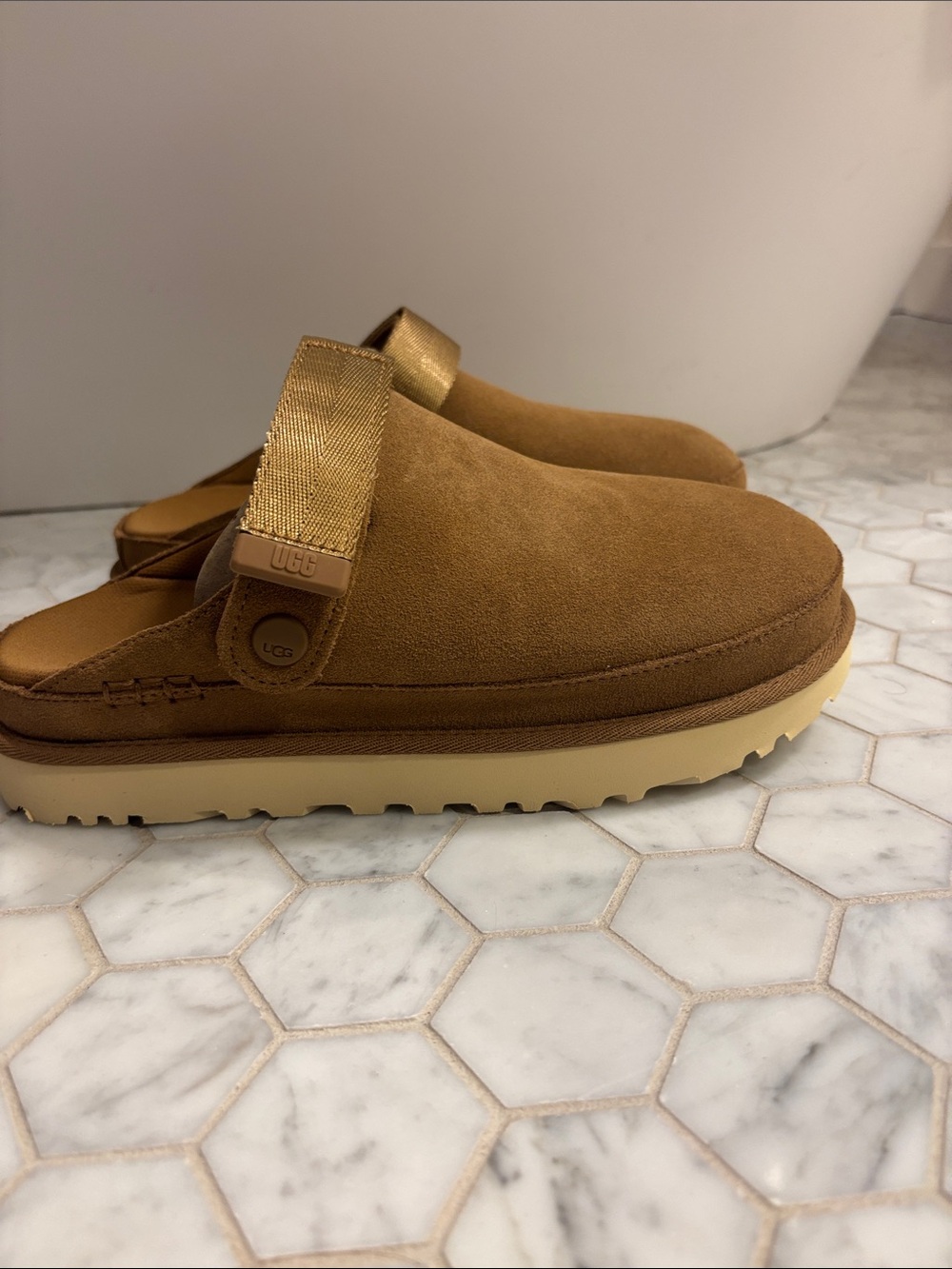 UGG women’s  Suede Slip-On Clog in Tan/Brown